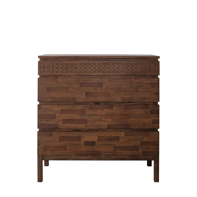 front on image of 4 drawer chest with warm brown finish and intricate frieze on top drawer
