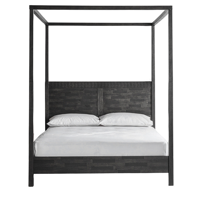 front on image of four poster black wooden bed