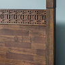 close up on mix of wood solids on headboard of bed