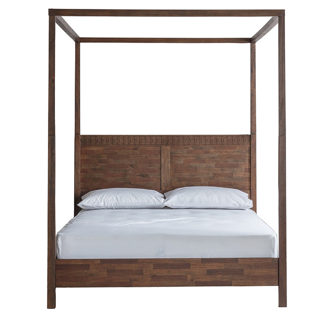 front on image cut out of four poster brown wooden bed