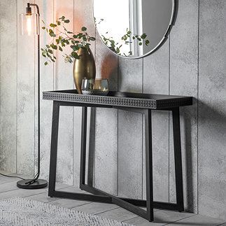 image of black wooden console table with inlaid frieze patterned front