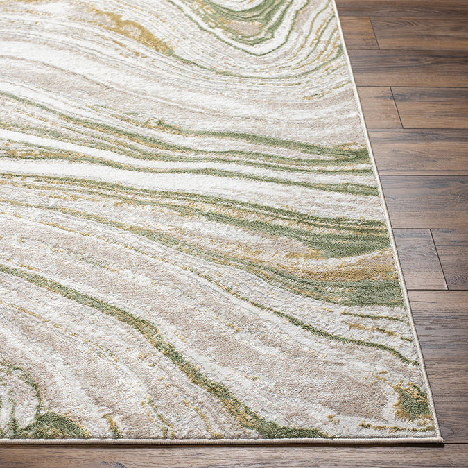 close up image of sage green marbled rug on dark wood flooring