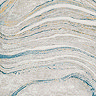 super close up image on pattern and colour of teal marbled rug