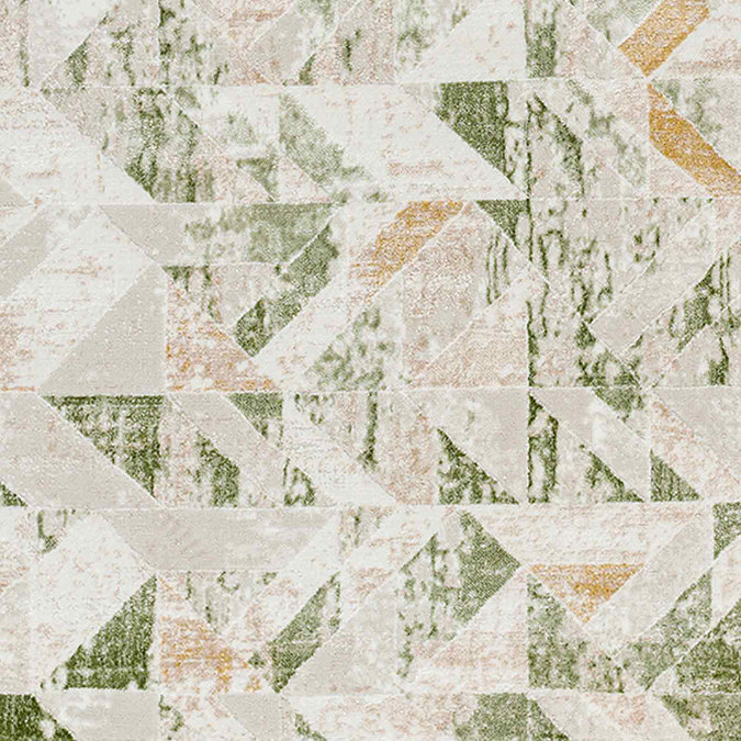 close up image of geometric rug to show sage and ivory colouring