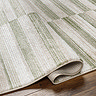 image of striped green and ivory rug folded slightly