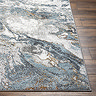 close up image of marbled blue colour and texture of rug on wooden floor
