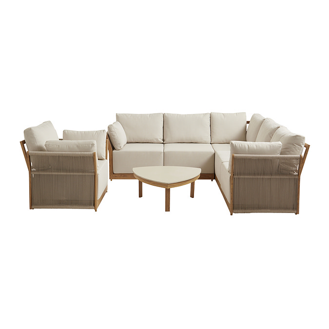 image cut out on white background of luxury cream garden corner lounge set with five seat sofa and chunky armchair