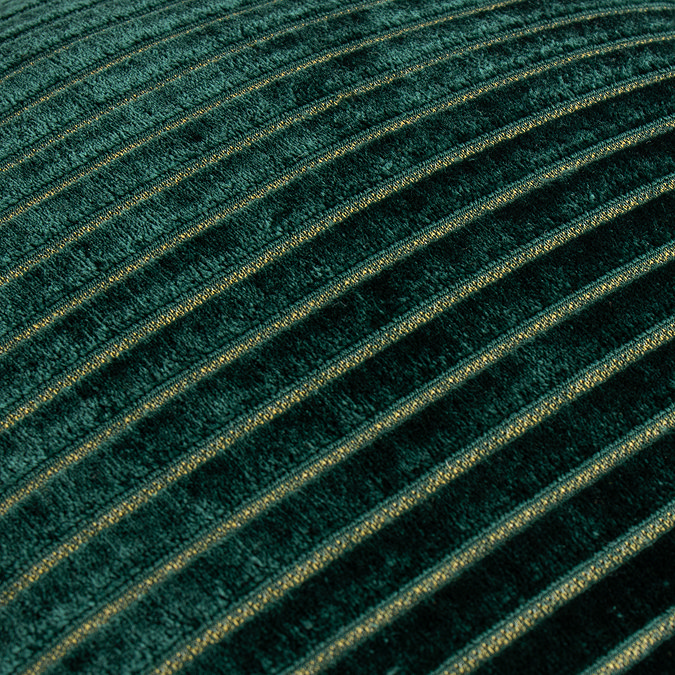 close up on emerald green cushion with gold stripe detail pattern