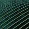 close up on emerald green cushion with gold stripe detail pattern