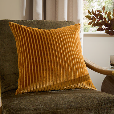 front image of gold square cushion with vertical stripe cushion, cut out on white background