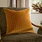 55x55cm gold cushion with vertical stripe detailing, sat on dark khaki chair