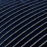 close up image of navy blue cushion with gold stripe detail pattern