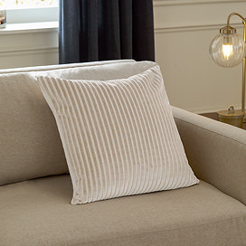 55x55cm oyster cream cushion with vertical stripe detail, sat in corner of cream sofa