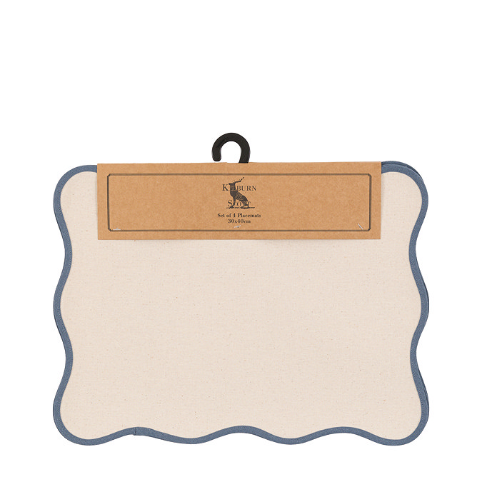 image cut out on white background of cream placemat with blue scalloped border