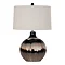 image cut out on white background of brown glass lamp with linen shade