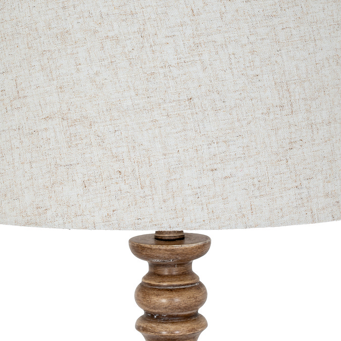 close up on grain and natural colour of floor lamp's edged linen shade