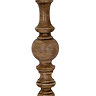 close up on brown wooden body of floor lamp with curved details