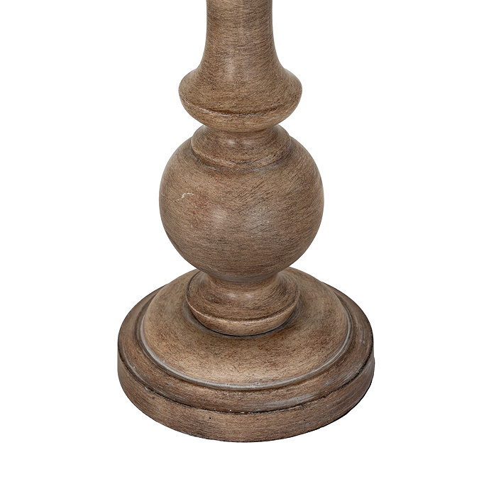 close up image of brown body and base of table lamp with curved shape and worn effect