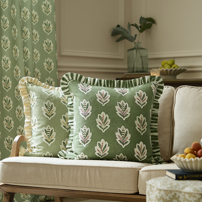 Sessile Leaf green feather cushion on a chair image