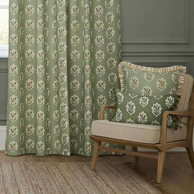 Sessile Leaf Sage Green Pencil Pleat Curtains over a window close up image