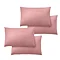 4 pillows with coral pink pillowcases, image cut out on white background