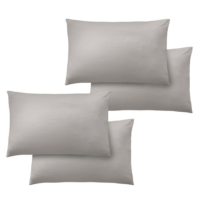 4 pillows in grey pillowcases, image cut out on white background