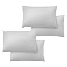 image cut out on plain background of four white pillowcases in two pairs