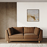 lifestyle image of large chunky kiln sofa with light beech legs