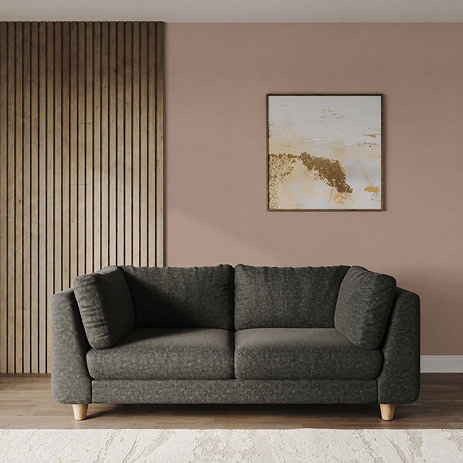 lifestyle image of large chunky moleskin sofa with light beech legs