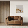 lifestyle image of medium chunky kiln sofa with light beech legs