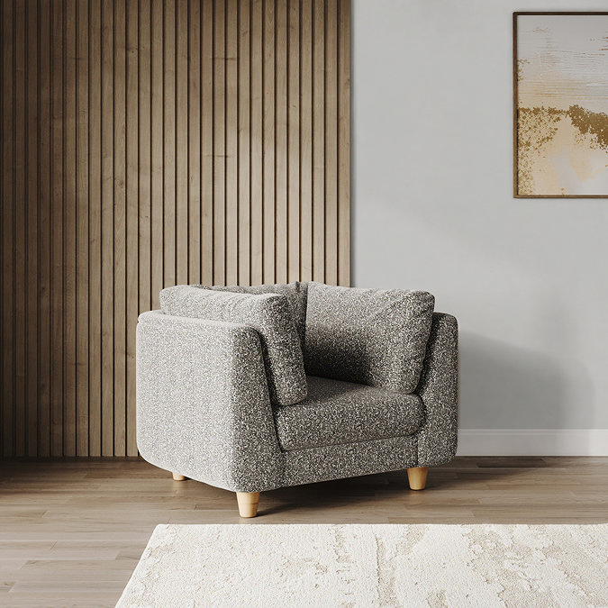 lifestyle image of chunky mist boucle armchair with light beech legs