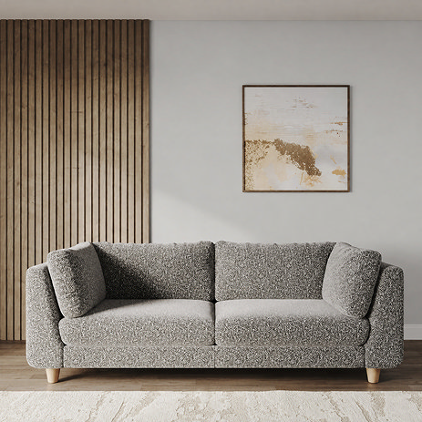 lifestyle image of chunky grand sofa in boucle mist with light beech feet