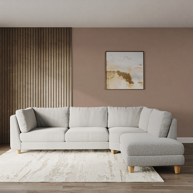 lifestyle image of chunky boucle left corner sofa in with light beech legs
