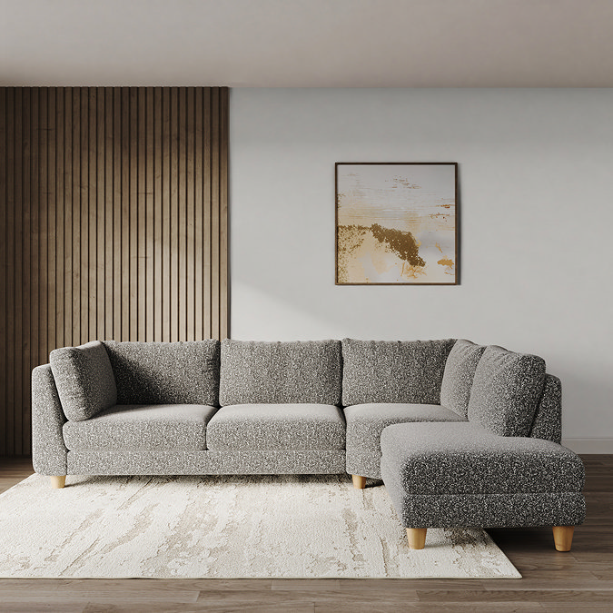 lifestyle image of chunky boucle left corner sofa with light beech legs