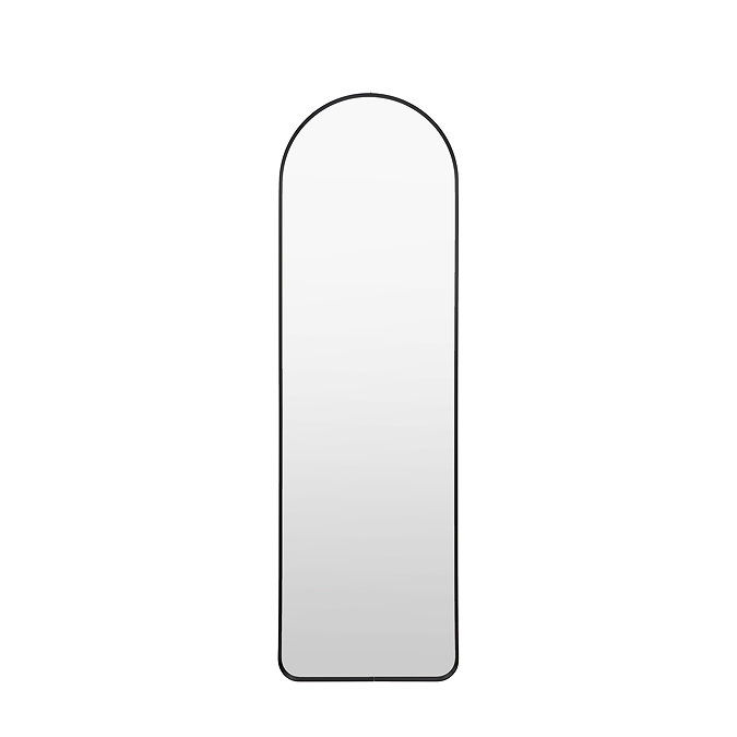 image cut out on white background of thin black free standing mirror with rounded top
