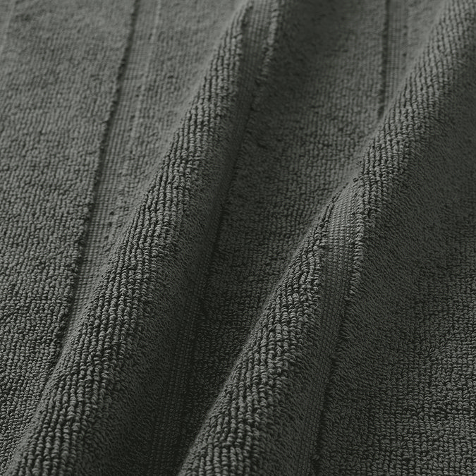 close up on texture and colour of ash grey cotton bath mat