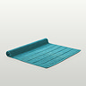 image of teal blue bath mat flat on light grey background