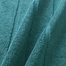 close up on texture and colour of teal blue bath mat