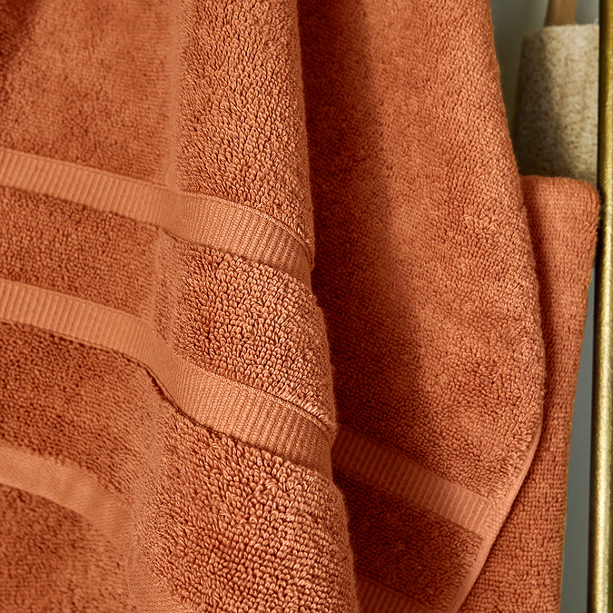 close up on weave detail of amber coloured towel