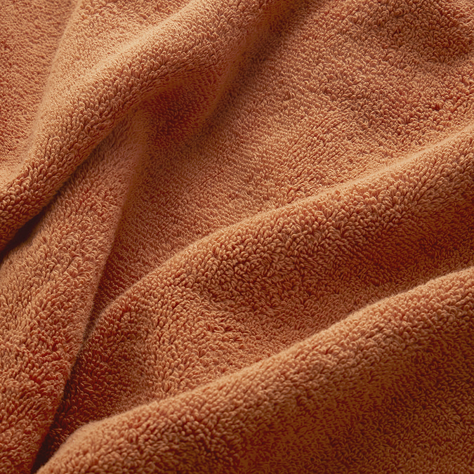 close up on texture of amber coloured towel