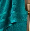 close up on border detail of teal towel