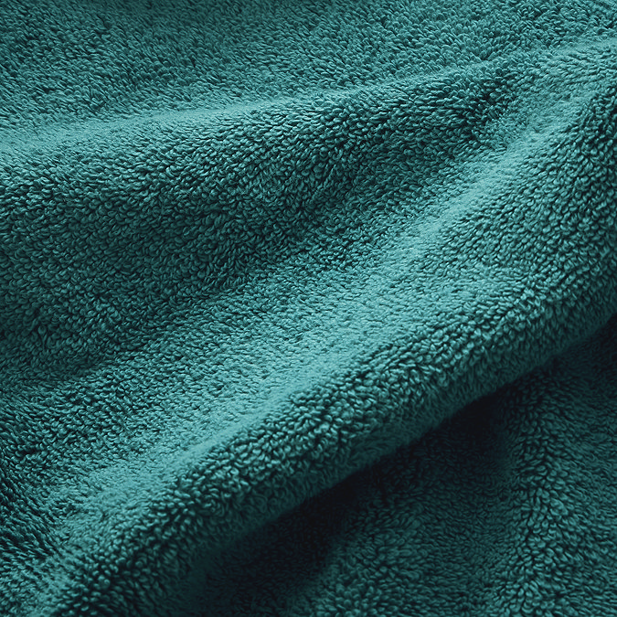 close up on texture and colour of teal towel