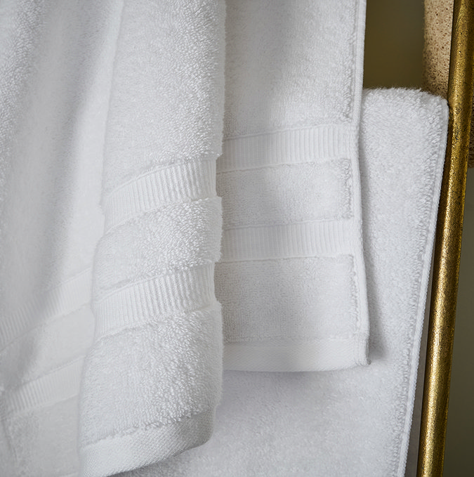 close upon border detail of white towels