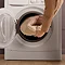 image of foot warmer being put into washing machine