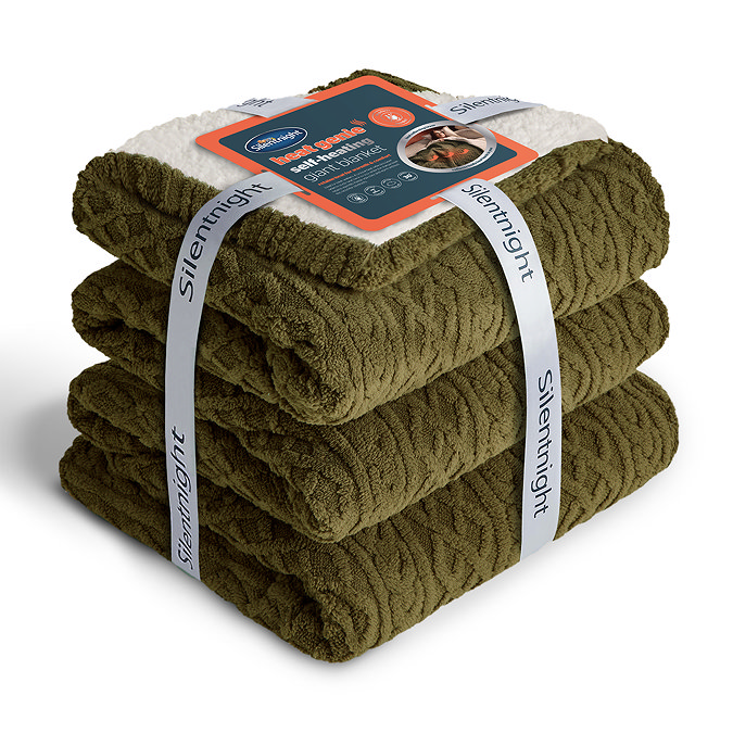 image of green cable knit blanket folded up with ribbon and card packaging