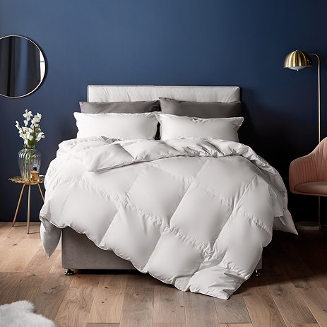 Feather and Down Duvet on bed image 1