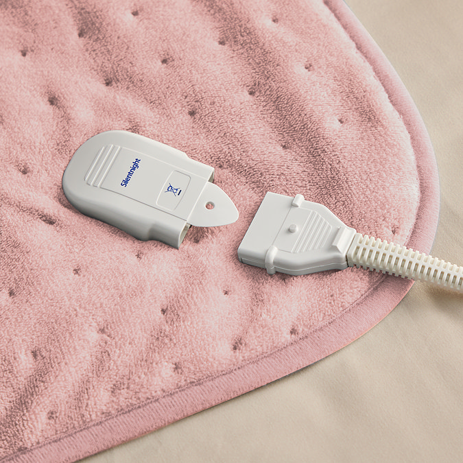 close up on plug application of heated throw