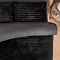 Ribbed faux fur Duvet Set in black close up on bed image 2