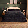 Ribbed faux fur Duvet Set in black on bed image 