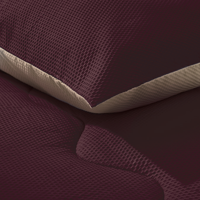 Coverless duvet on bed close up image 5